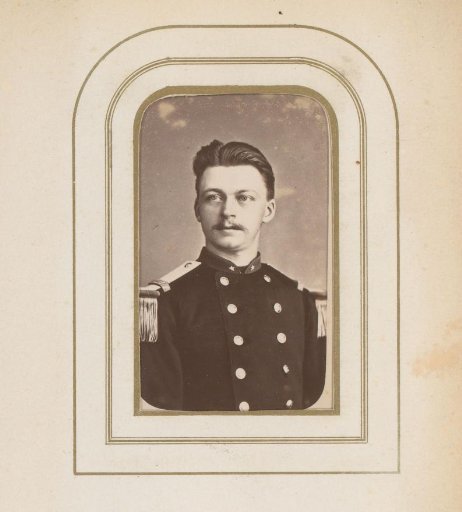 Portrait of a man with a mustache in uniform