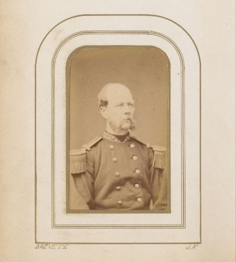 Portrait of a man with a mustache in uniform
