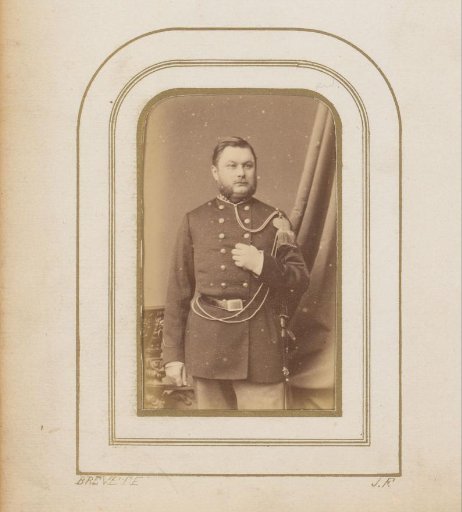 Portrait of a Standing Man in Uniform with a Sword
