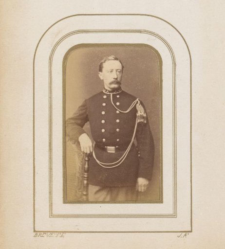 Portrait of a Standing Man with a Mustache in Uniform