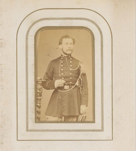 Portrait of a Standing Man with a Cigar in Uniform