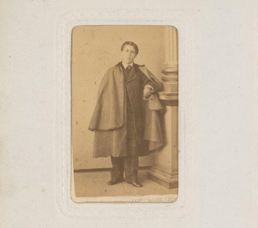 Portrait of a Standing Young Man with Overcoat