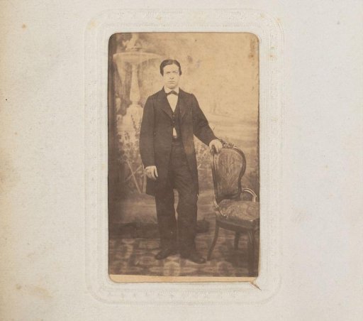 Portrait of a Man, Standing by a Chair