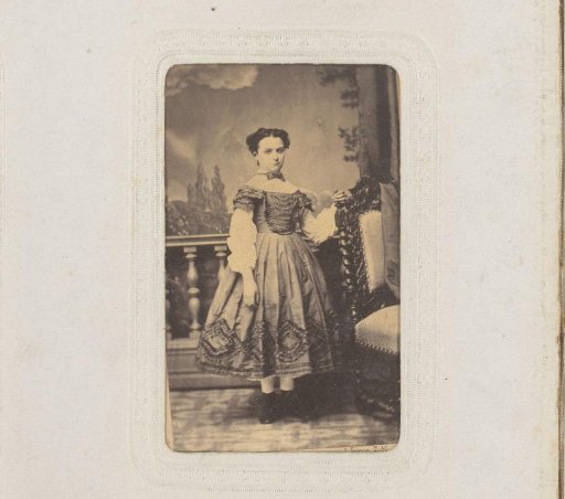 Portrait of a Young Woman, Standing by a Chair