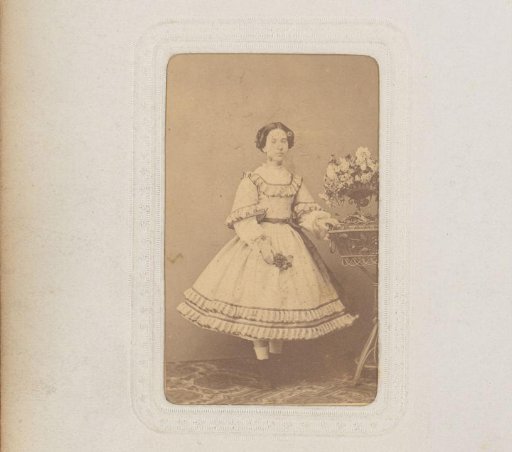 Portrait of a Standing Young Woman with Flowers