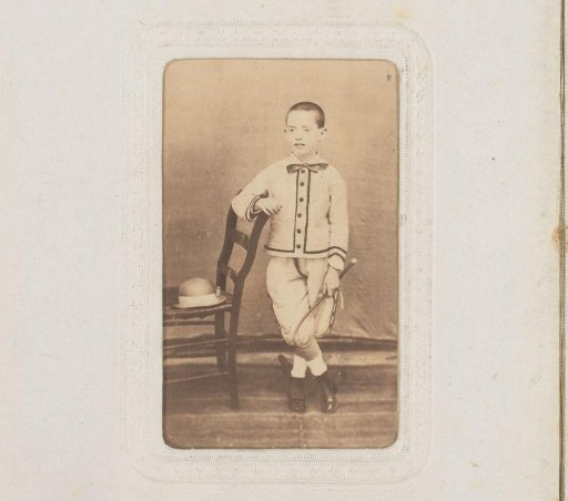 Portrait of a Boy with a Racket and Hat