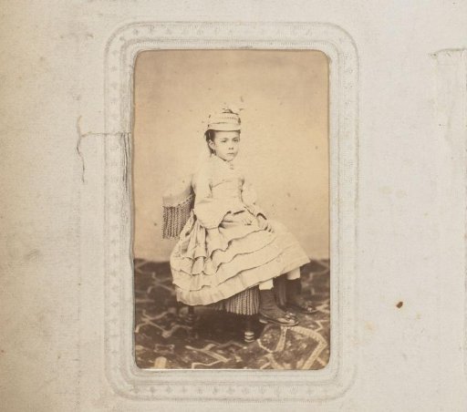 Portrait of a Seated Girl with a Cap