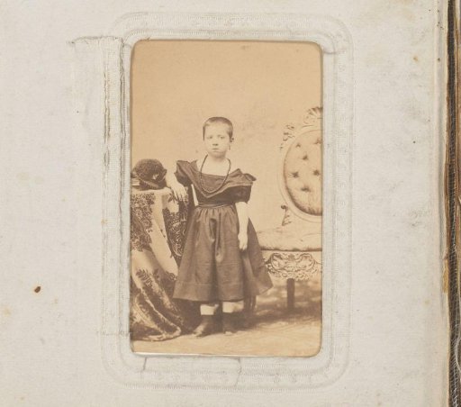 Portrait of a Girl with Necklace and Cap