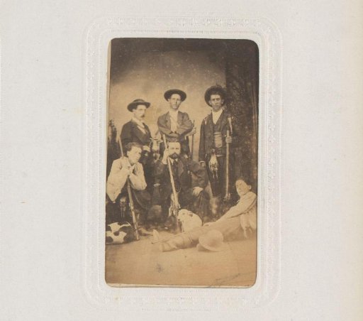Group Portrait of Hunters with Guns and Dogs