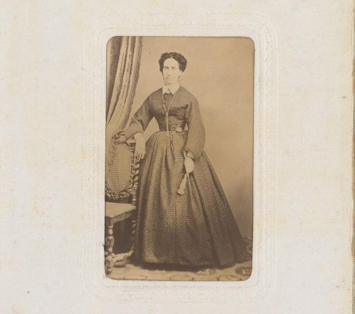 Portrait of a Woman with a Fan, Standing by a Chair