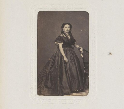 Portrait of a Woman Standing by a Chair
