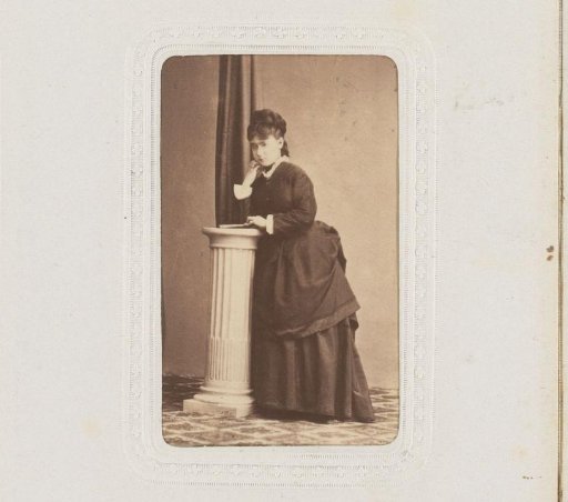 Portrait of a Woman Leaning on a Pillar