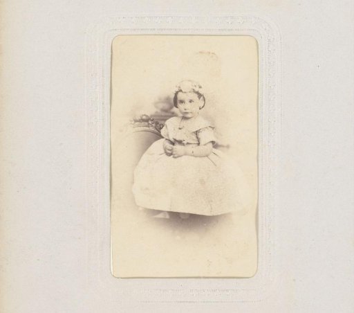 Portrait of a Girl Sitting on a Chair
