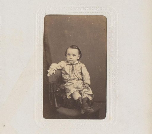 Portrait of a seated boy