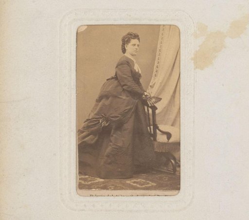 Portrait of a Woman with Fan, Standing by a Chair