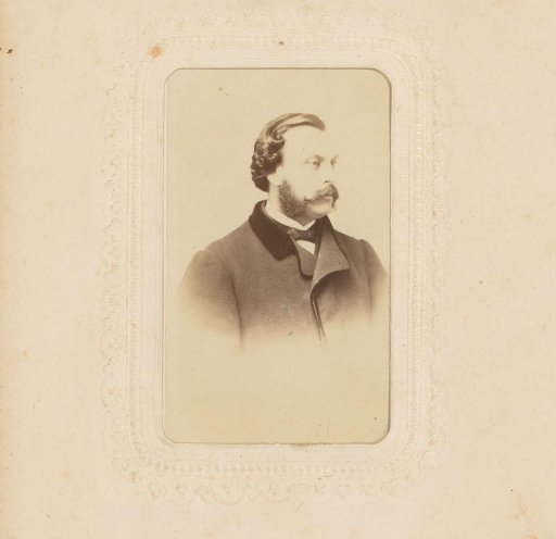 Portrait of a man with a mustache and sideburns