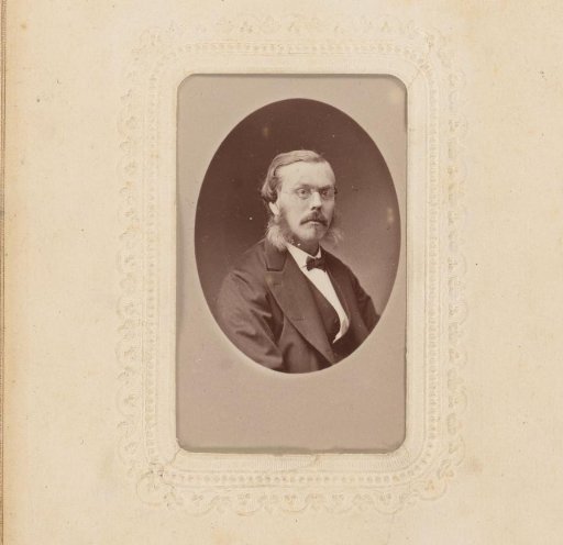 Portrait of a man with spectacles and sideburns