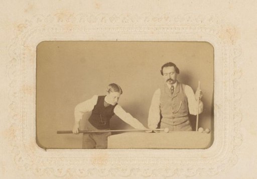 Man and Boy Playing Billiards