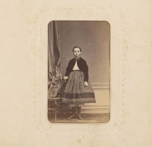 Portrait of a Girl Standing by a Chair