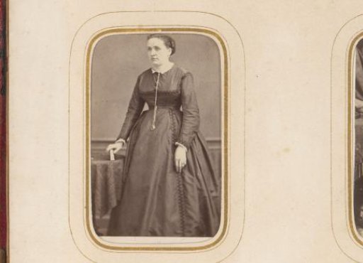 Portrait of a woman with a necklace and a book