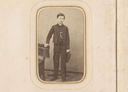 Portrait of a standing boy in uniform