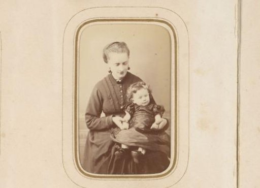 Portrait of a seated woman with a child
