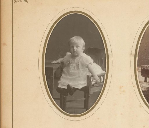 Portrait of a baby seated on a chair