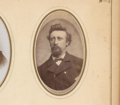 Portrait of a man with a moustache, beard and bow tie