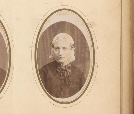 Portrait of a young woman in a white cap and ear-covers