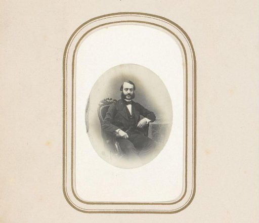 Portrait of a seated man with sideburns