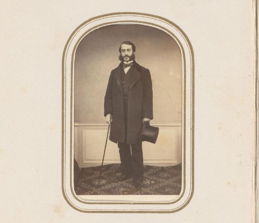 Portrait of a man with sideburns and a hat in his hand
