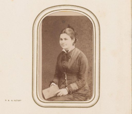 Portrait of a young woman with a book