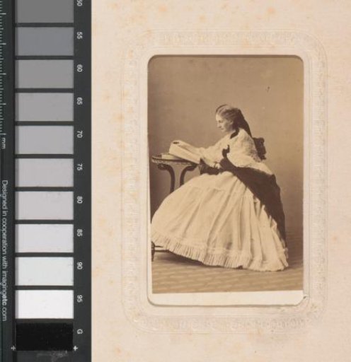 Portrait of a seated reading woman