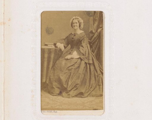 Portrait of a seated old woman
