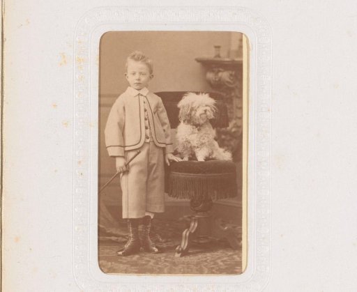 Portrait of a boy with a dog