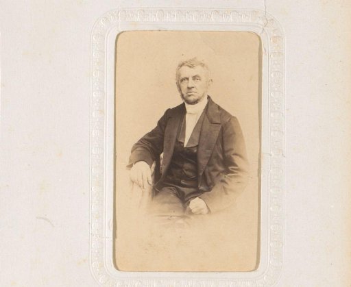 Portrait of a seated old man
