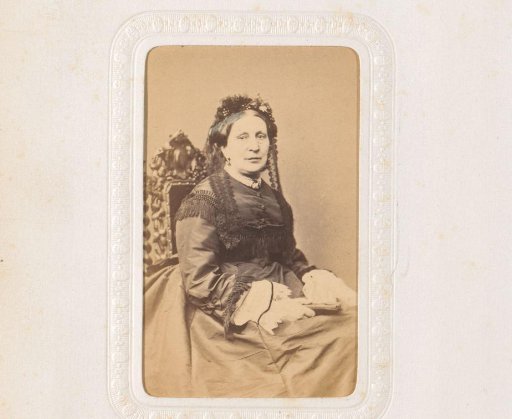 Portrait of a seated old woman