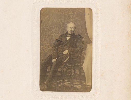 Portrait of an elderly seated man