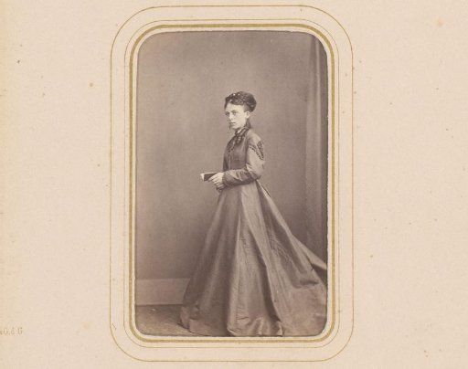 Portrait of a Standing Woman with a Book in Hand