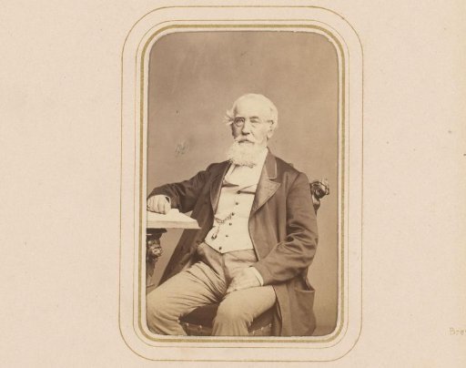 Portrait of an Old Man with a Beard, Sitting at a Table