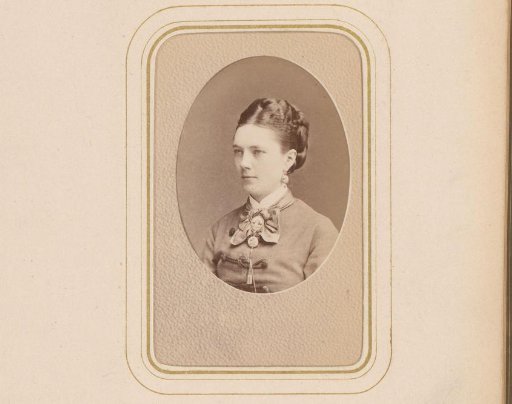 Portrait of a Woman with Earrings and a Medallion Necklace