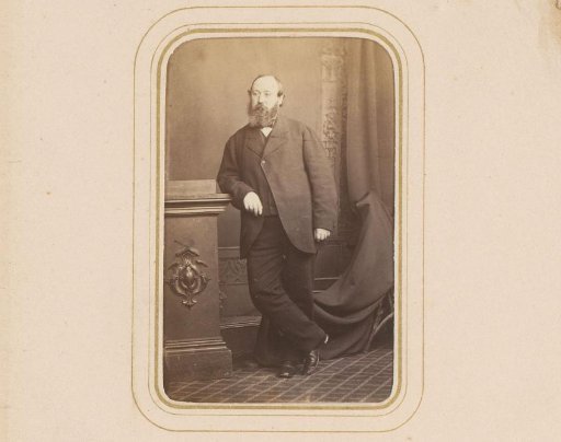 Portrait of a Man with a Beard, Standing by a Pillar