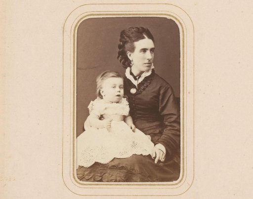 Portrait of a Seated Woman with a Baby in a White Dress on Her Lap
