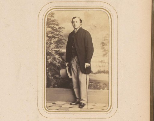 Portrait of a Man with a Top Hat and Walking Stick in Hand, Standing Before a Decor