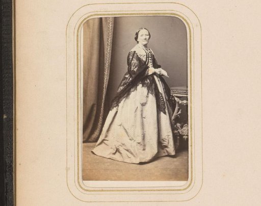 Portrait of a Standing Woman with Fan in Hand