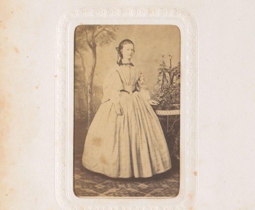 Portrait of a standing young woman