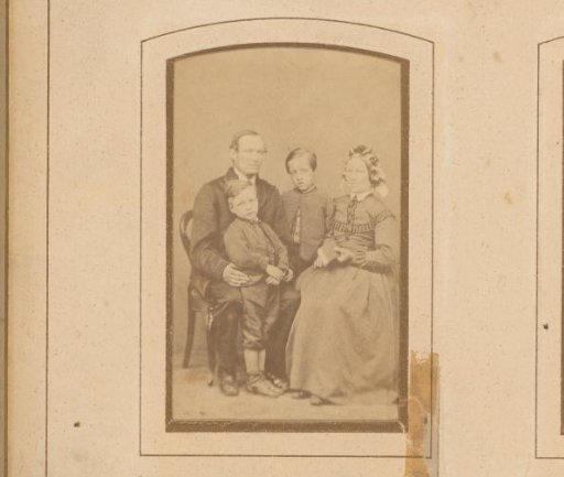 Portrait of a seated woman, a seated man and two standing boys