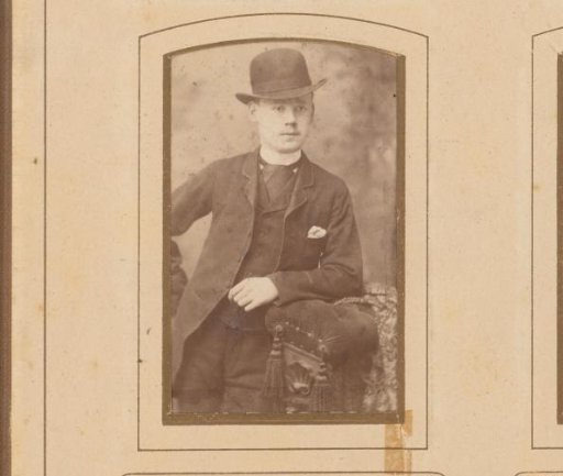 Portrait of a Standing Young Man with a Round Hat, Leaning on the Back of a Chair