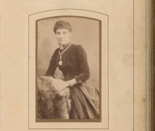 Portrait of a Standing Woman with a Necklace Featuring a Medallion