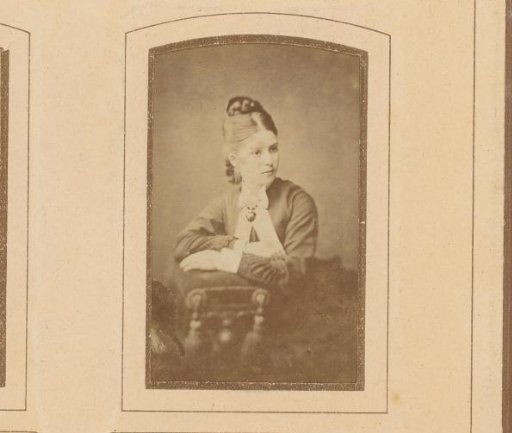 Portrait of a Young Woman with a Necklace Featuring a Heart-Shaped Medallion
